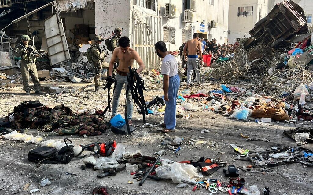 Hamas surrenders weapons and uniforms IDF photo